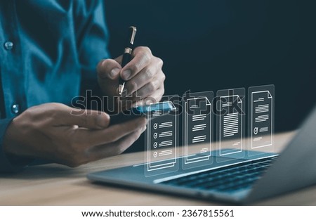 businessman manages data on a laptop, document files digital electronic. concept Enterprise Resource Planning system or ERP is software for management recorded in a Database. business paperless
