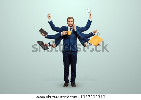 Businessman with many hands in a suit. Works simultaneously with several objects, a mug, a magnifying glass, papers, a contract, a telephone. Multitasking, efficient business worker concept
