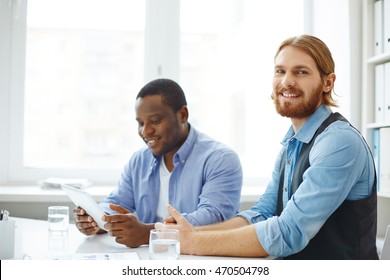 Businessman at meeting - Shutterstock ID 470504798
