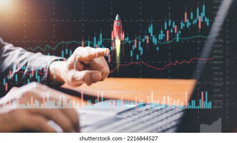 Businessman Or Merchant Showing Hologram Stock With The Direction Of Rising Like A Rocket In Hand Finance Concept, Stock Market, Fast Growing Business Like A Rocket. 