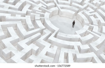 businessman in the middle of a maze - Shutterstock ID 156772589