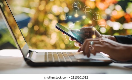 Businessman with mobile smartphone in hand paying online and shopping on virtual interface global network, online banking and digital marketing.