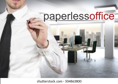 Businessman In Modern Digital Office Writing Paperless Office