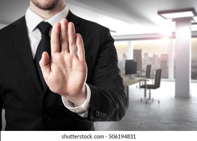 businessman in modern office room hand stop gesture - Shutterstock ID 506194831