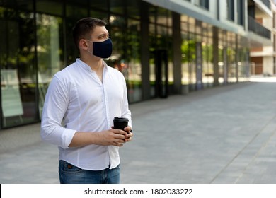 Businessman Near Office In Protective Cloth Face Mask. Man In Casual Clothes Standing On The Street. New Social Behavior New Normal Concept