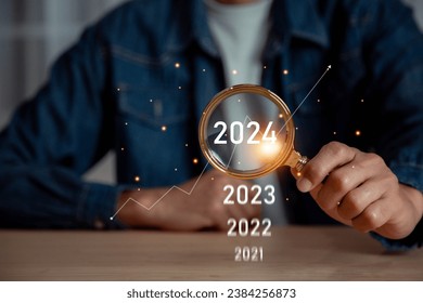 businessman new year business goals 2024, positive indicators 2024 , Planning and challenge strategy business in new year  Concept .