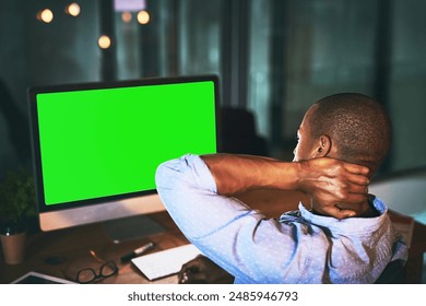 Businessman, night and neck pain with green screen on computer for stress, burnout or fatigue at office. Back view of man or employee working late with technology or mockup space for ache or injury - Powered by Shutterstock