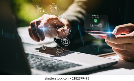 Businessman with notebook computer paying online shopping on virtual interface. Online payment banking  transaction and e-commerce digital marketing technology concept. 3D illustration. - Shutterstock ID 2182879493