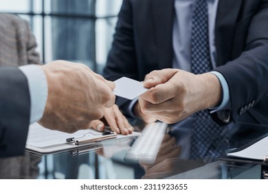 businessman offer personal contact information to customer, acquaintance concept - Powered by Shutterstock