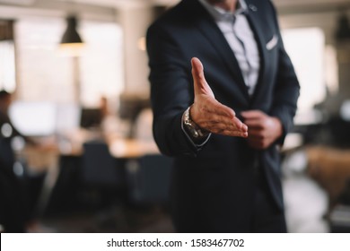 Businessman Offering Hand For Handshake 