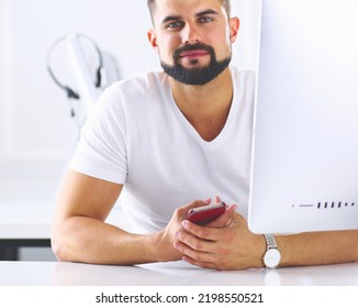 Businessman In The Office On The Phone With Headset, Skype