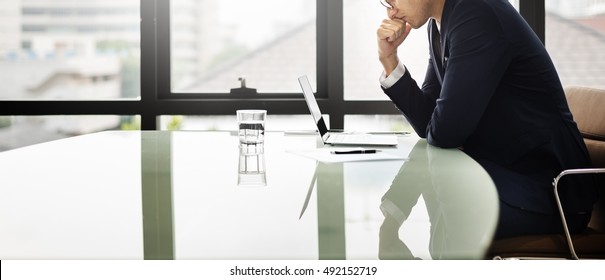 Businessman Office Thinking Laptop Concept - Shutterstock ID 492152719