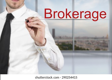 Businessman In Office Writing Brokerage In The Air