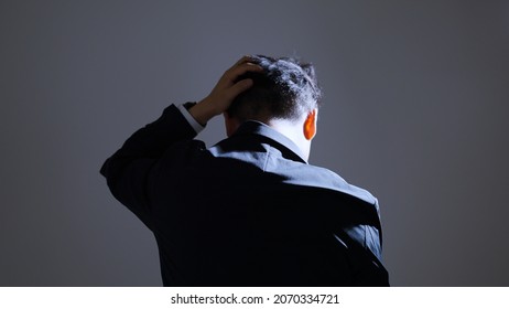Businessman on a black background - Shutterstock ID 2070334721