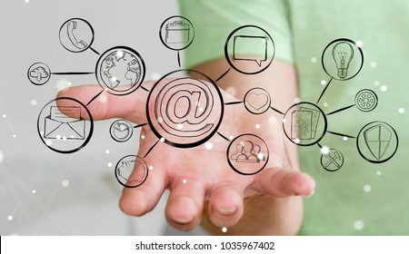 Businessman on blurred background holding multimedia hand-drawn interface