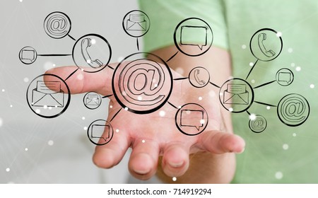 Businessman on blurred background holding hand-drawn graph with contact and connections