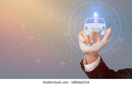 Businessman on blurred background modern smart car - Shutterstock ID 1085665154
