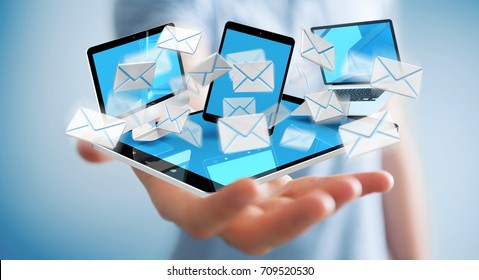 Businessman on blurred background receiving e-mails on his digital devices 3D rendering - Shutterstock ID 709520530