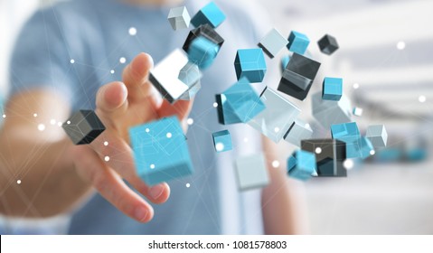 Businessman on blurred background touching floating blue shiny cube network 3D rendering