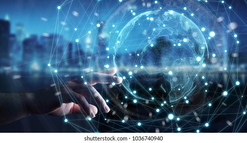 Businessman on blurred background using planet earth network sphere interface 3D rendering - Shutterstock ID 1036740940