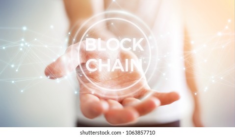Businessman on blurred background using blockchain cryptocurrency interface 3D rendering - Shutterstock ID 1063857710