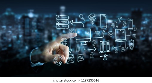 Businessman on blurred background using tech devices and icons thin line interface - Shutterstock ID 1199235616