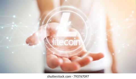 Businessman on blurred background using litecoins cryptocurrency 3D rendering - Shutterstock ID 793767097