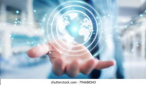 Businessman on blurred background using planet earth network sphere interface 3D rendering - Shutterstock ID 794688343