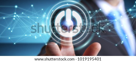 Businessman on blurred background using 3D render power button with connections