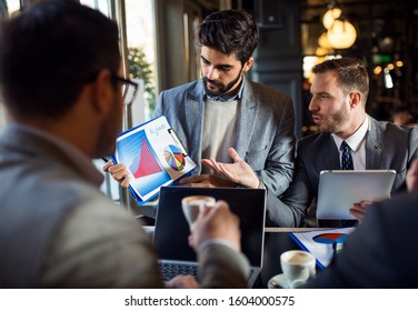 Businessman on business meeting showing analysis