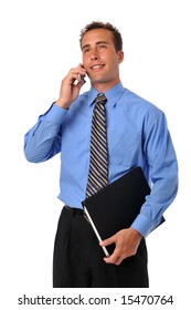 Businessman on the cellphone and holding a portfolio