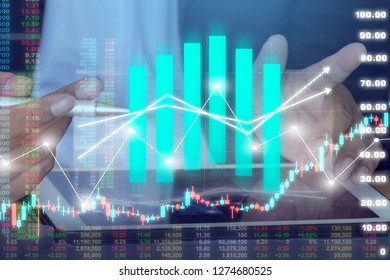 Businessman on digital stock market financial positive indicator background. Double exposure of growth graph futuristic economic currency chart investor data analysis money exchange technology concept
