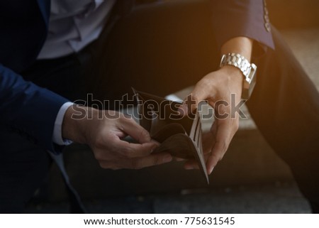 BUSINESSMAN on Have Money 
 Unemployed and Bankrupt Looks into his Empty Wallet.  Stress Crisis, Unemployed Businessmen are Waiting for New Jobs, Recession Situation and Hopelessness Crisis Concept. Stock photo © 