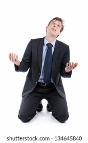 Businessman on his knees desperate asking why