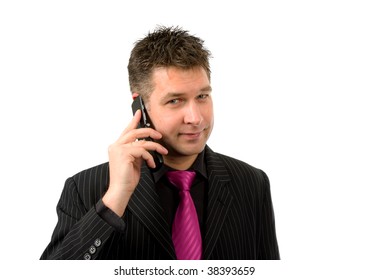 Businessman is on the phone looking at camera over white background