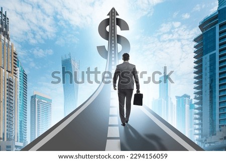 Businessman on the road to wealth