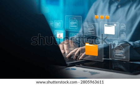 Businessman organizing digital documents for cloud data storage and technology, concept of document folder database.