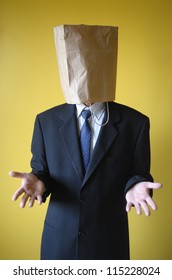 Businessman With Paper Bag On A Head