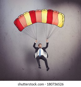 Businessman with parachute