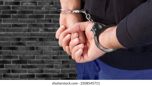 Businessman person hands in handcuffs arrested