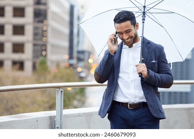 Businessman, phone call and umbrella with communication in city for justice, advocate for legal with tech. Male lawyer, rain or parasol with conversation and mobile in urban, attorney in New York - Powered by Shutterstock