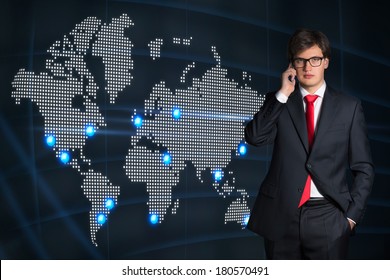 Businessman, phone conversation. world map.