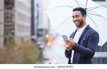 Businessman, phone and umbrella with communication in city for justice, advocate for legal with tech. Male lawyer, rain or parasol for safety in urban with mobile, attorney in New York for court - Powered by Shutterstock