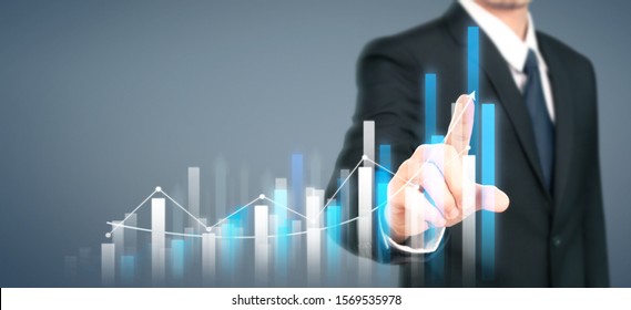 Businessman Plan Graph Growth And Increase Of Chart Positive Indicators In His Business