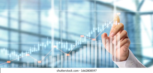 Businessman plan graph growth and increase of chart positive indicators in his business - Shutterstock ID 1662808597