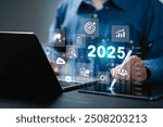 Businessman plan strategy marketing and finance to goal in 2025 planning business growth with technology AI and environmental care to New Year resolutions business. digital transformation 2025