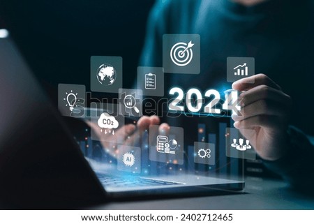 Businessman plan strategy marketing and finance to goal in 2024 planning business growth with technology AI and environmental care to New Year resolutions business. digital transformation 2024