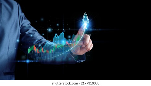 Businessman planning to invest in stock market. man touching success goals icon on virtual screen, stock graph is rising, economy is recovering, stock trading, bussiness start up, business success.
