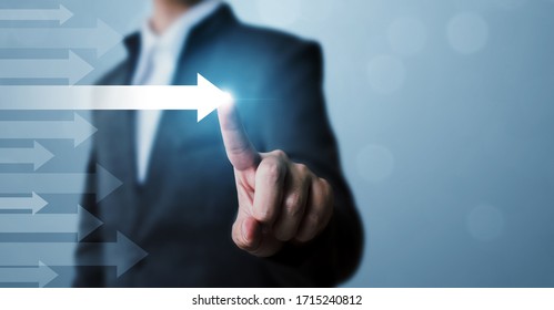 Businessman pointing arrow. Concept of business success, Influencer, Opinion leader and benchmark