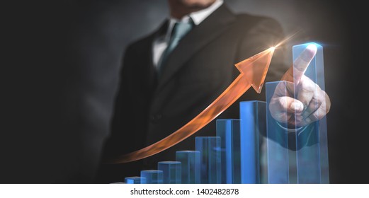 Businessman Pointing Arrow Graph And Chart, Corporate Growth Plan Or Business Development To Success And Growing Growth Concept